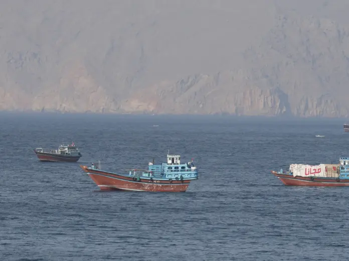 Ships and tankers in the Strait of Hormuz off the coast of Musandam, Oman