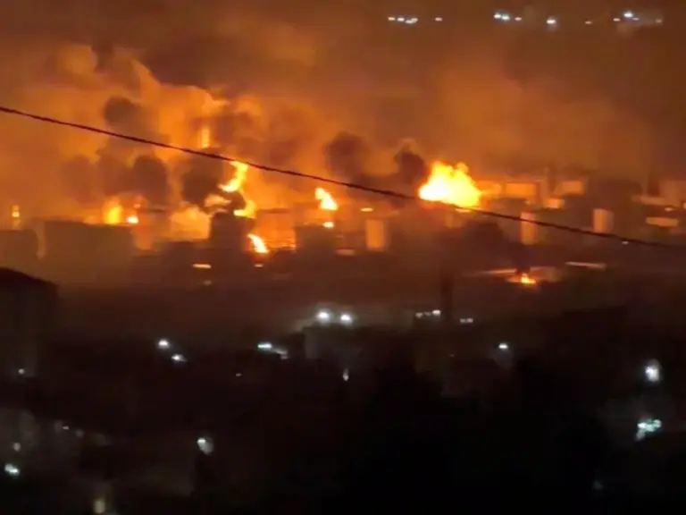 Fire and smoke rise at the Tuapse oil refinery near the Tuapse port, following a Ukrainian drone attack, according to Russian officials, in Tuapse, Krasnodar Krai, Russia, in this screengrab obtained from a social media video released on April 20, 2026. SOCIAL MEDIA/via REUTERS THIS IMAGE HAS BEEN SUPPLIED BY A THIRD PARTY. NO RESALES. NO ARCHIVES. NEWS USE ONLY. VERIFICATION: - Reuters was able to confirm the location from the position of buildings and road layout, which matched the file and sa