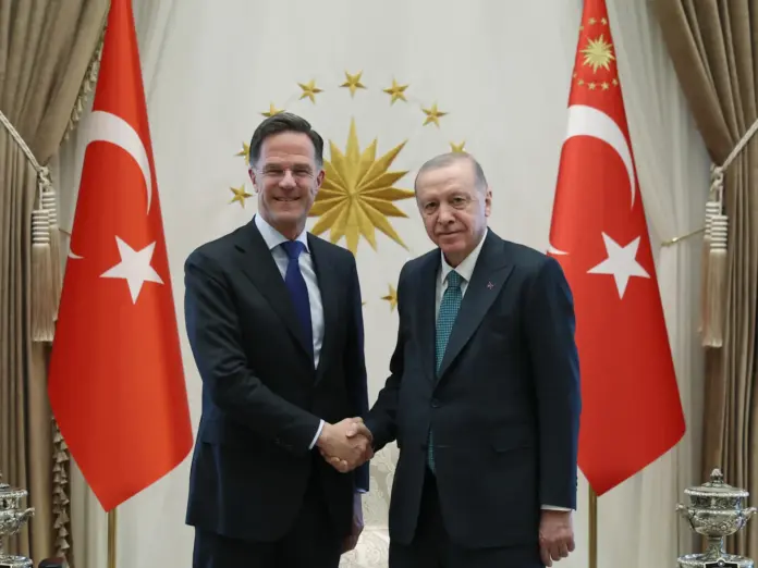 This handout photograph taken and released by Turkish Presidential Press Office on April 22, 2026, shows Turkey's President Recep Tayyip Erdogan (R) shaking hands with NATO Secretary General Mark Rutte at the Presidential Complex in Ankara.