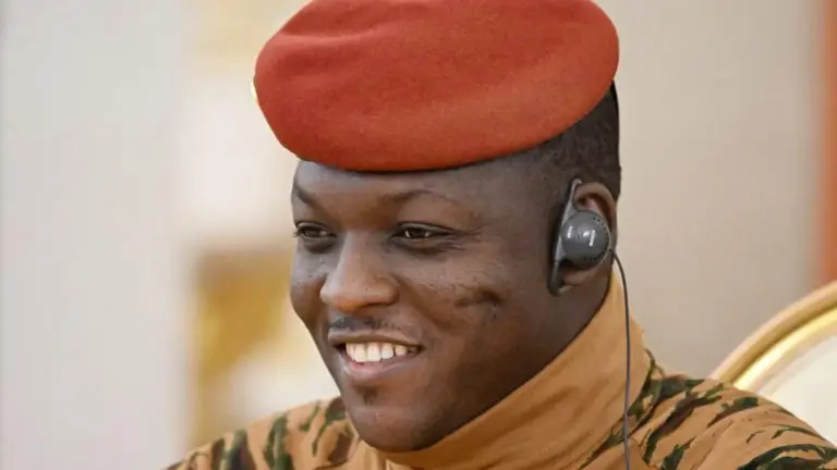 Anadolu via Getty Images Burkina Faso President Ibrahim Traoré in a red beret and military uniform