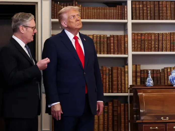 British Prime Minister Keir Starmer gestures next to U.S. President Donald Trump during their meeting at Chequers, near Aylesbury, Britain, September 18, 2025. REUTERS/Kevin Lamarque