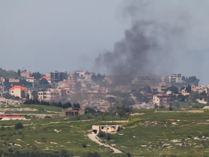 Smoke rising in front of buildings in Lebanon