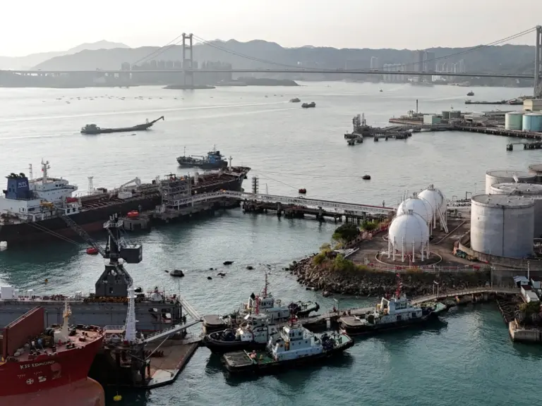 FILE PHOTO: A drone view shows a Chinese-flagged oil tanker moored at an oil terminal at Tsing Yi port, with Tsing Ma bridge in the background, in Hong Kong, China March 19, 2026. REUTERS/Joyce Zhou/File Photo
