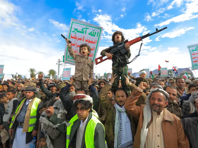 Young Houthi supporters hold weapons during a rally in solidarity with Iran and Lebanon, amid the US-Israeli war with Iran, in the Yemeni capital Sanaa on March 27, 2026.