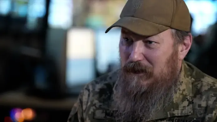BBC/Moose Campbell Unmanned Systems Forces commander Robert Brovdi, wearing a cap and with a long beard, is pictured speaking to the BBC