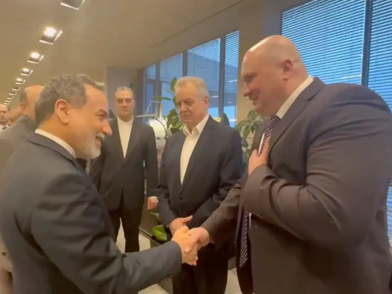 Iran's Foreign Minister Abbas Araghchi is greeted by officials during his visit to Russia