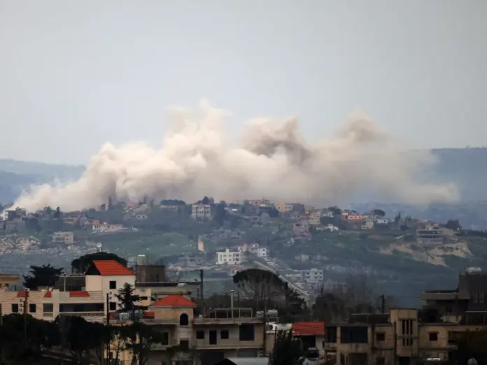 Smoke rises from explosions during Israeli military operations in the Lebanese village of Taybeh
