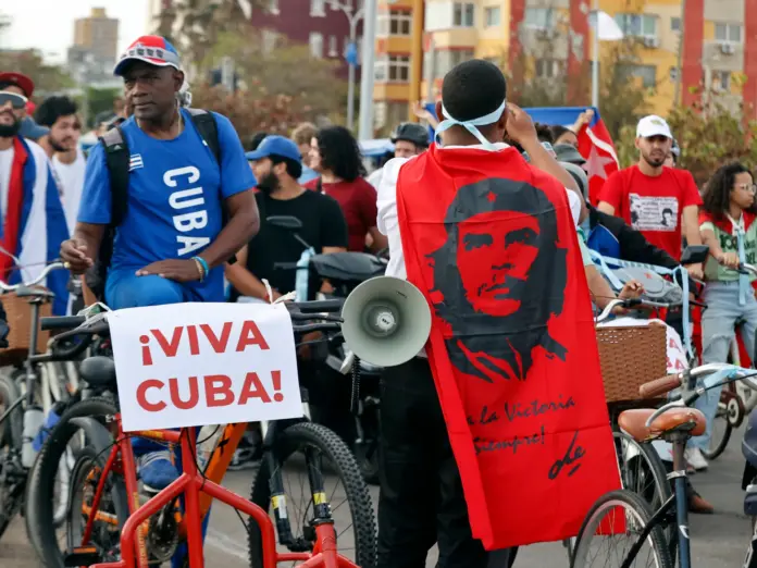 epa12866281 People prepare to ride their bicycles as part of the 'Youth Anti-Imperialist Parade on Wheels' along the Malecon in Havana, Cuba, 02 April 2026. The island continues to struggle with the impacts of a severe energy crisis amid the oil embargo imposed by the US government since January 2026. EPA/ERNESTO MASTRASCUSA