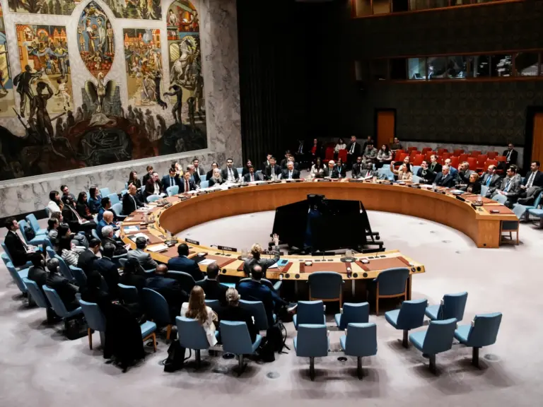 Members of the United Nations Security Council vote in favor of a sanctions resolution regarding the situation in Iran and the Middle East at U.N. headquarters in New York City, U.S., March 12, 2026. REUTERS/Eduardo Munoz