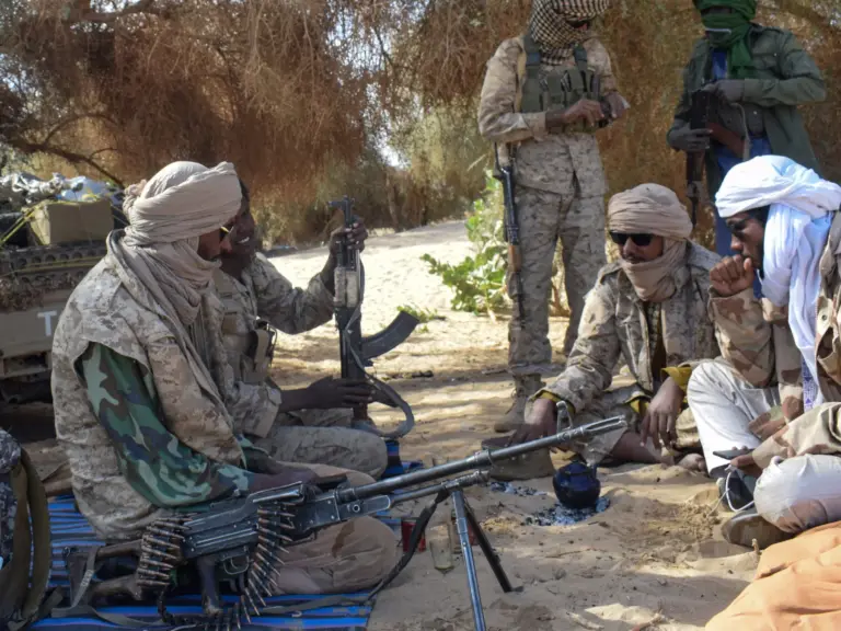 Fighters from Permanent Strategic Framework for the Defense of the People of Azawad (CSP-DPA) sit together