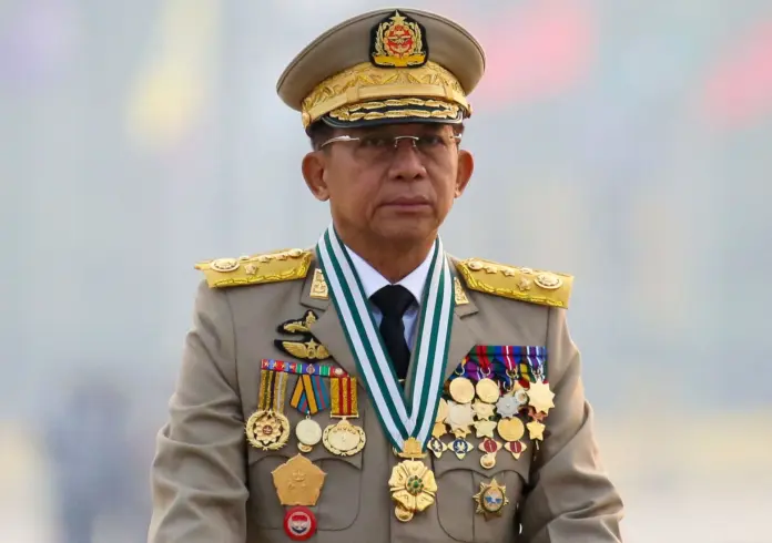 FILE PHOTO: Myanmar's junta chief Senior General Min Aung Hlaing, who ousted the elected government in a coup on February 1, presides an army parade on Armed Forces Day in Naypyitaw, Myanmar, March 27, 2021. REUTERS/Stringer/File Photo
