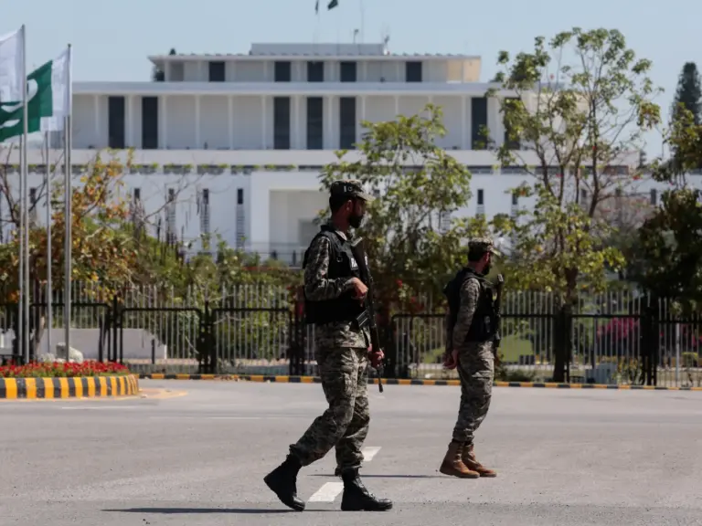 Pakistani Rangers patrol near the president's house.
