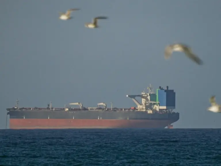 A ship waits to pass through the Strait of Hormuz