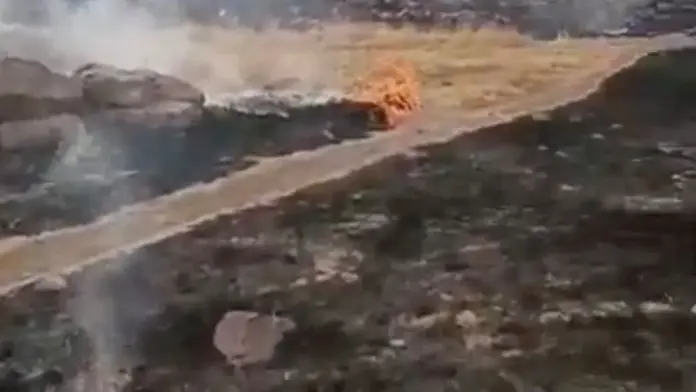 Smoke rises amid burned areas at a military base in Hombori, Mali, in this still image obtained from an undated social media video released April 30, 2026. Al Qaeda affiliate Jama'at Nusrat al-Islam wal-Muslimin (JNIM) said on Thursday it had captured the military base of Hombori. Social media via REUTERS THIS IMAGE HAS BEEN SUPPLIED BY A THIRD PARTY. NO RESALES. NO ARCHIVES. NEWS USE ONLY VERIFICATION: Reuters verified the location from the gates, buildings, barrier and mountains seen in the vi