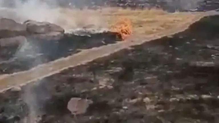 Smoke rises amid burned areas at a military base in Hombori, Mali, in this still image obtained from an undated social media video released April 30, 2026. Al Qaeda affiliate Jama'at Nusrat al-Islam wal-Muslimin (JNIM) said on Thursday it had captured the military base of Hombori. Social media via REUTERS THIS IMAGE HAS BEEN SUPPLIED BY A THIRD PARTY. NO RESALES. NO ARCHIVES. NEWS USE ONLY VERIFICATION: Reuters verified the location from the gates, buildings, barrier and mountains seen in the vi